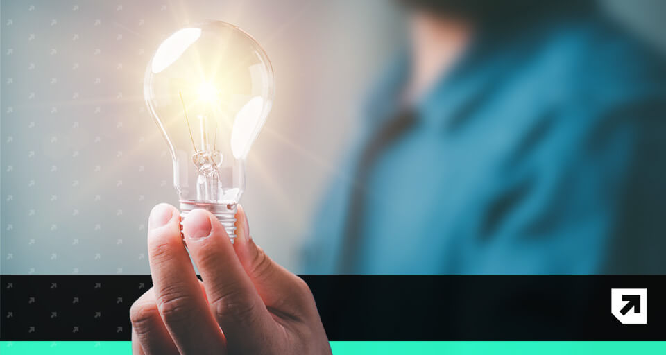 A person holding a light bulb | B2B email marketing tips