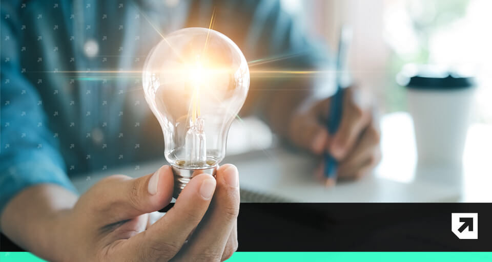 A person holding a light bulb | B2B email marketing tips